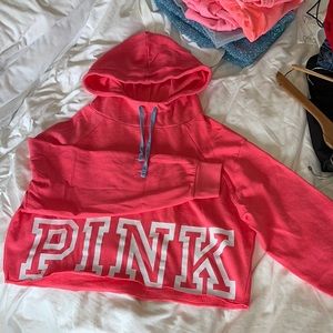 Victoria’s Secret Pink crop hoodie with blue drawstrings. Size M.